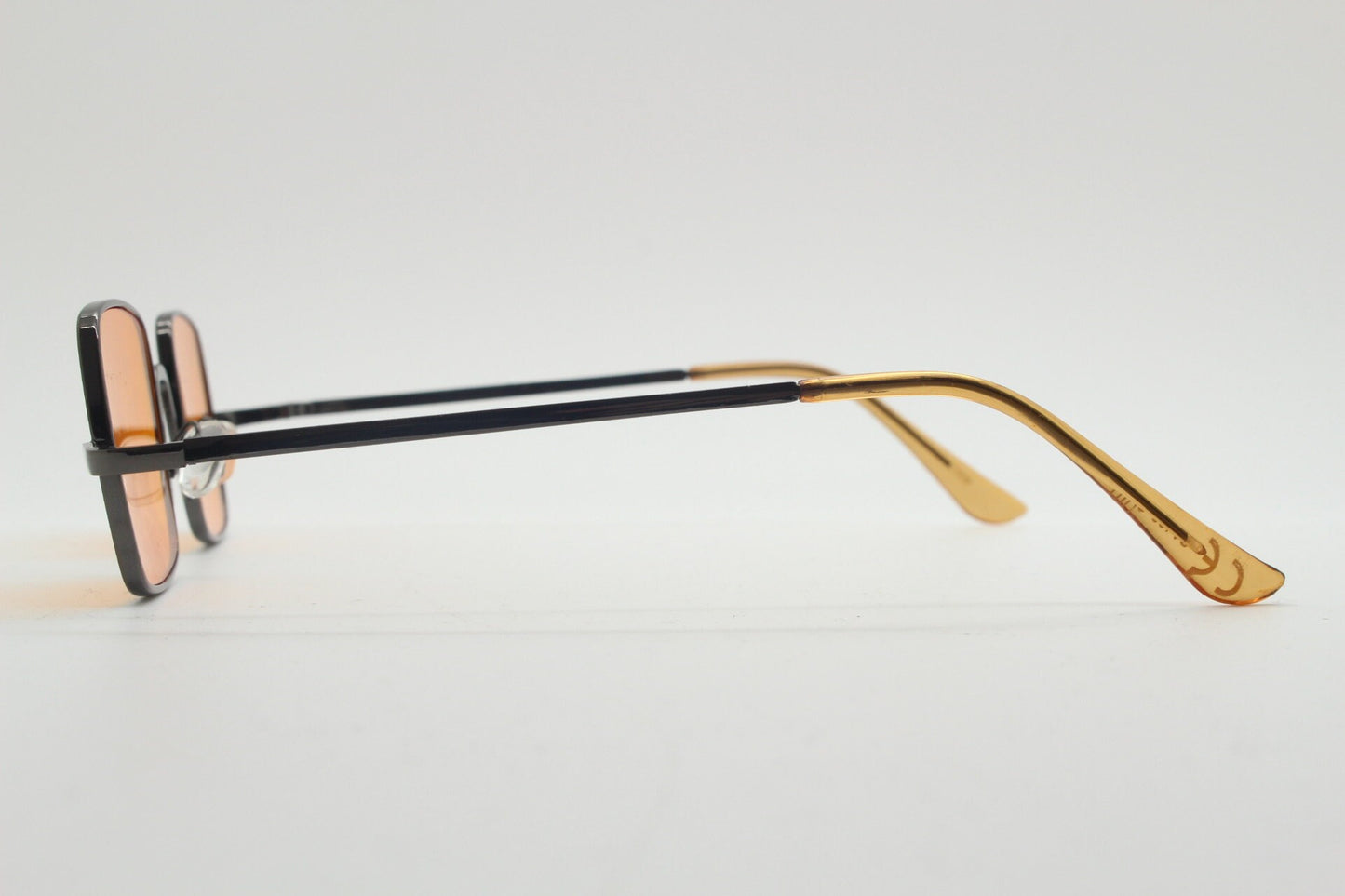90s vintage small square sunglasses. Imposing minimal bronze brown metal Victorian style frame with blazing orange lenses. Steampunk. NOS