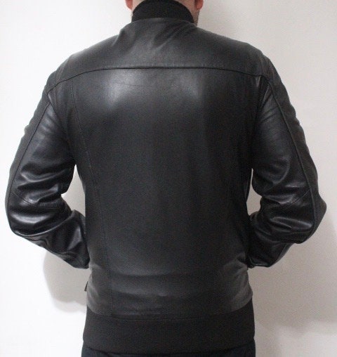 Paul Smith high collar bomber jacket. Plain black lambskin minimal flap pocket mens zipper. Ribbed collar. Size Medium