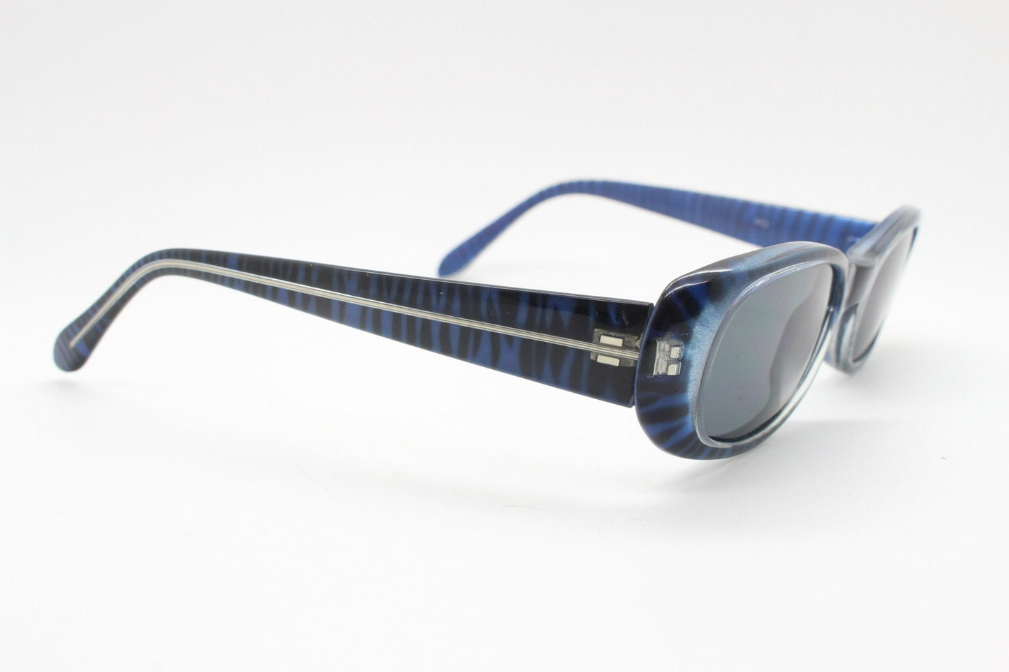 90s vintage rectangular sunglasses. Unbelievable blue tiger print low profile frame with black lenses. Y2K unused NOS. 2000s
