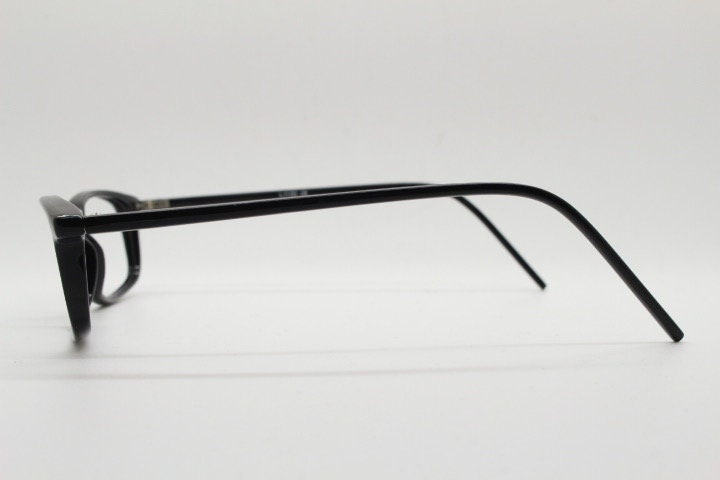 90s vintage modified wayfarer design eye glasses. Black low profile slim optical frames. Prescription eyeglasses. RX Spectacles. NOS