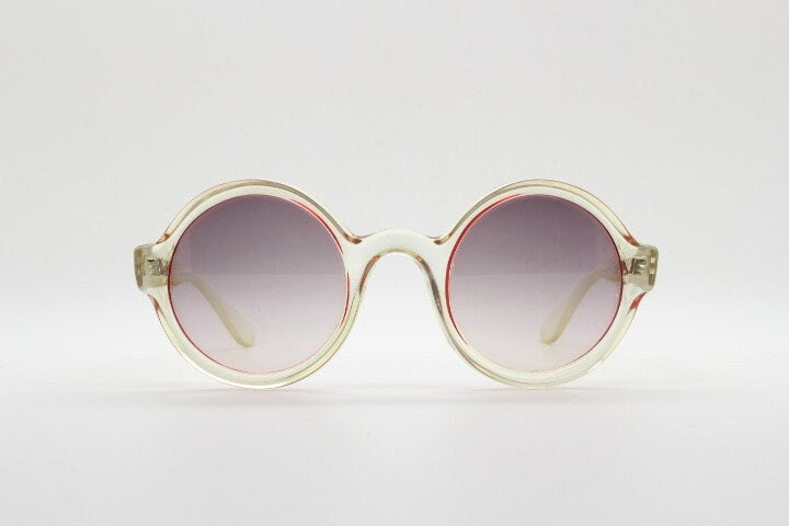 Mary Quant 60s vintage round sunglasses made in France. Yellow crystal transparent lucite frame in with contrasting dark graduating lenses