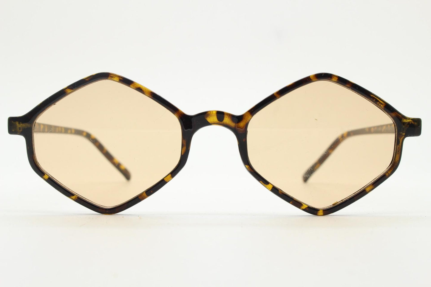 90s vintage diamond hexagon sunglasses. Atmospheric 6 sided tortoise gloss frame with very light tone brown lenses. Unused NOS