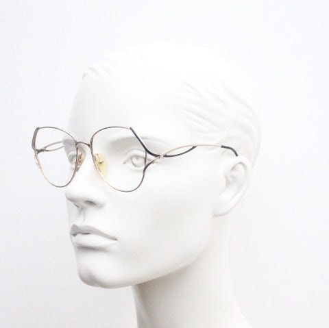 Viennaline 70s vintage angular round eye glasses. Slightly oversized subtle gold chrome optical frame with incredible arms. Prescription RX