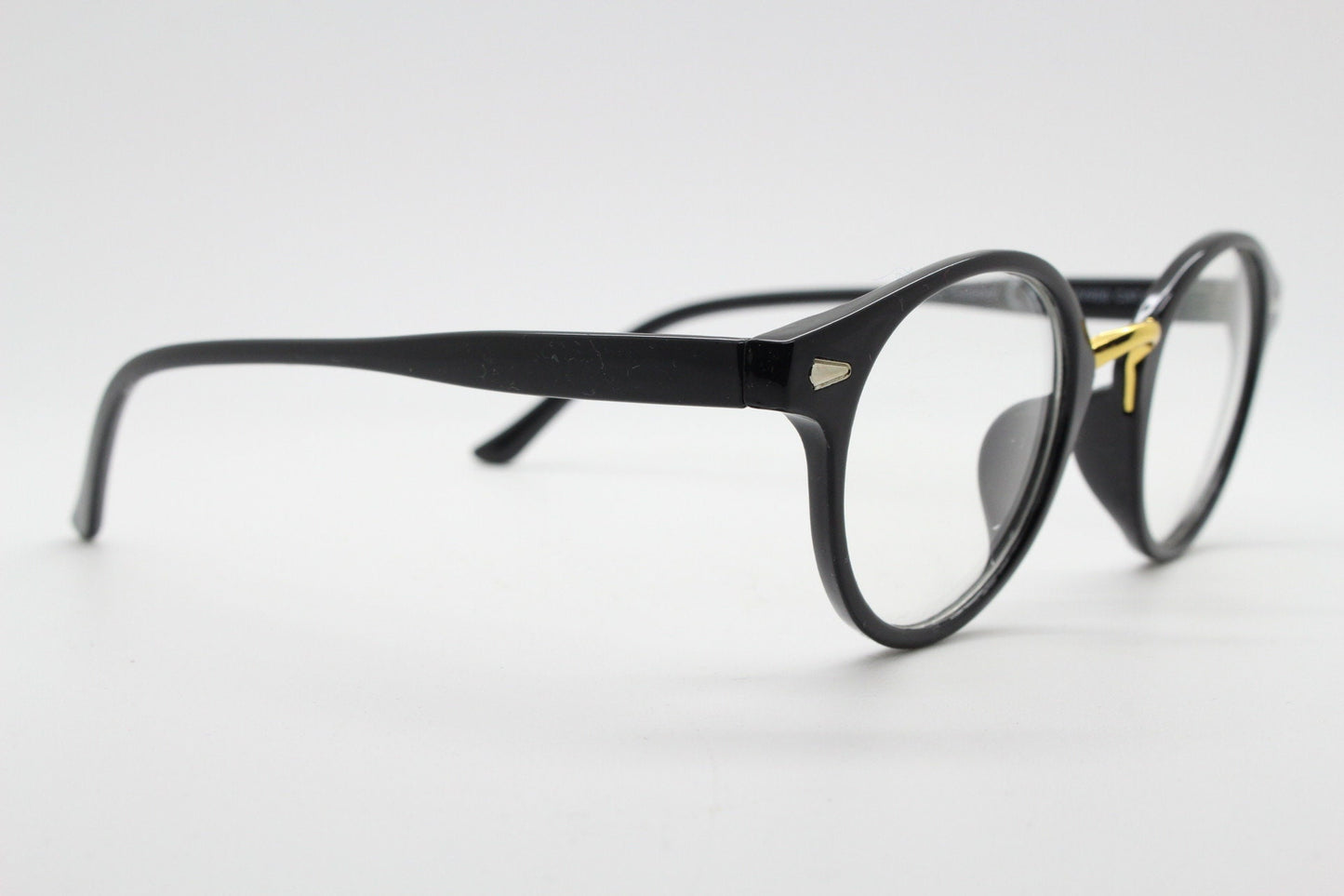 90s vintage slender frame glasses. Black with gold bridge optical frames. 40s, 50s style prescription eyeglasses. Clear lens eyeglasses. RX