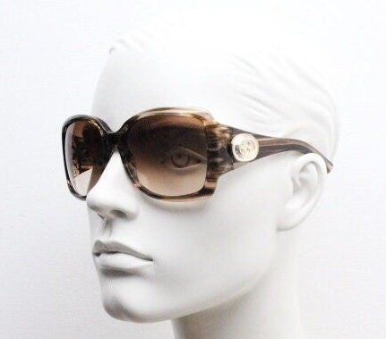 Gucci Y2K vintage oversized square sunglasses made in Italy. Transparent mottled brown frame with glitter sparkles and big stand out logo