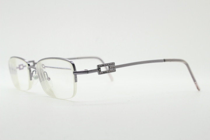 Gucci rectangular eye glasses made in Italy. Slim metal wire low profile optical half frame with diamante logo. Prescription eyeglasses. RX