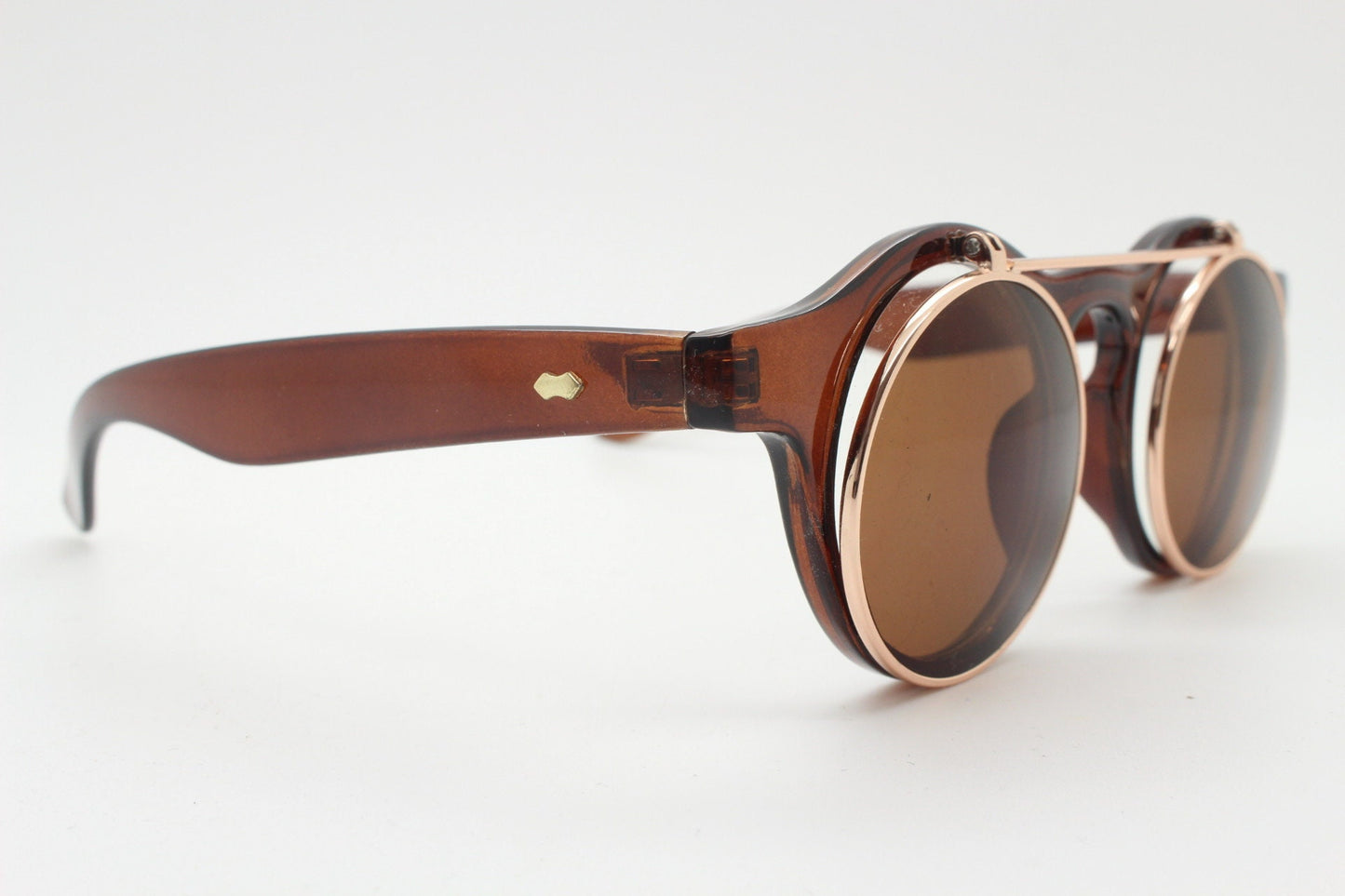 Vintage 90s round flipper sunglasses. 30s style brown frame with clear lenses and flip up sunglasses visor. BNWT unused