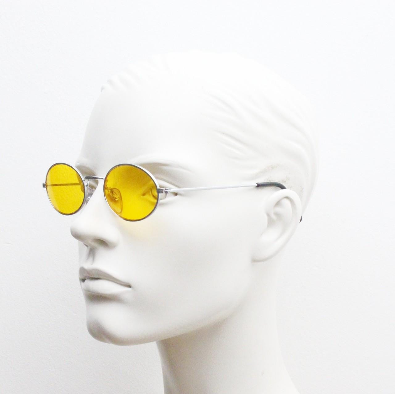 90s vintage small oval sunglasses. Minimal slender silver chrome metal frame with blazing orange lenses. Micro. Steampunk. Cosplay. NOS