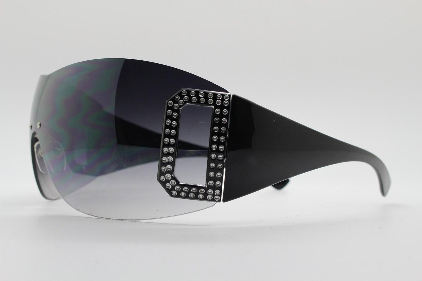 Y2K vintage visor sunglasses. 2000's black wraparound mono lens shield design with big diamante effect crest. 00s uber fashion mini mask NOS