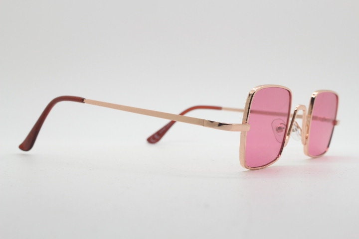 Y2K vintage small square sunglasses. Womens imposing minimal gold metal frame with pink lenses. Steampunk. Cosplay. Unused 2000s NOS