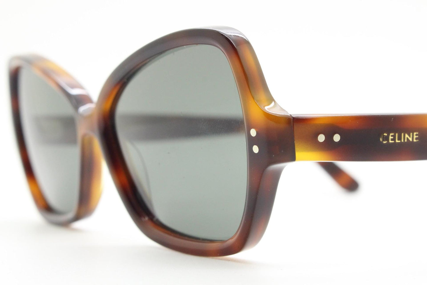 Celine Paris vintage angular cat eye sunglasses made in Italy. Tortoise butterfly frame in good proportions with green lenses. Womens Y2K