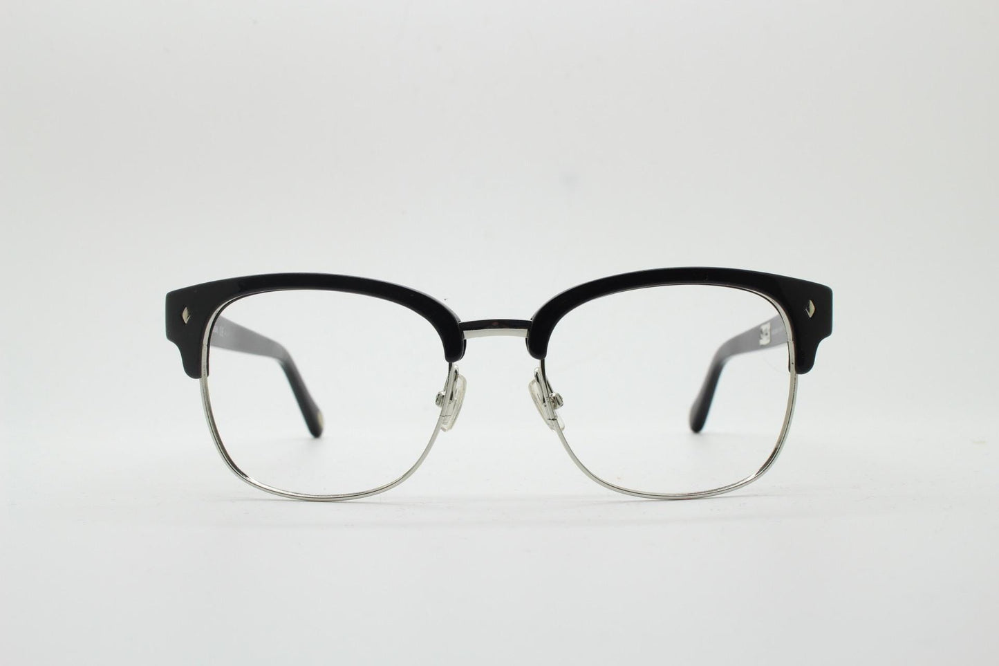 Fossil brow line eye glasses. Sharp and clean clubmaster format. Silver optical frames with black browline. Prescription eyeglasses. RX
