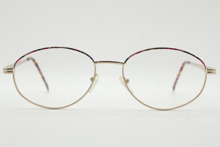 90s vintage oval eye glasses. Bright golden optical frames with coloured enamel brows. Prescription RX spectacles. Clear lens NOS