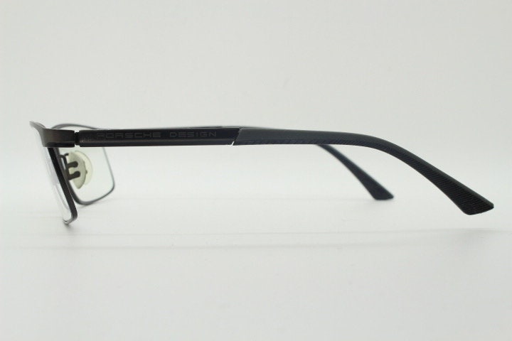 Porsche design rectangular eye glasses model 8251 made in Japan. Minimal gunmetal grey wire optical frame. Prescription RX spectacles
