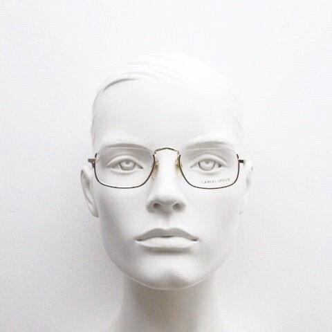 Giorgio Armani rectangular eye glasses made in Italy. Half frame underwire with metallic tortoise enamel. Prescription optical eyeglasses RX