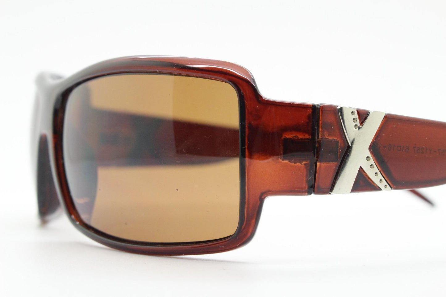 Y2K vintage visor sunglasses. Transparent brown wrap around shield with curved lenses and big X crest. 2000s biker bug eye. NOS