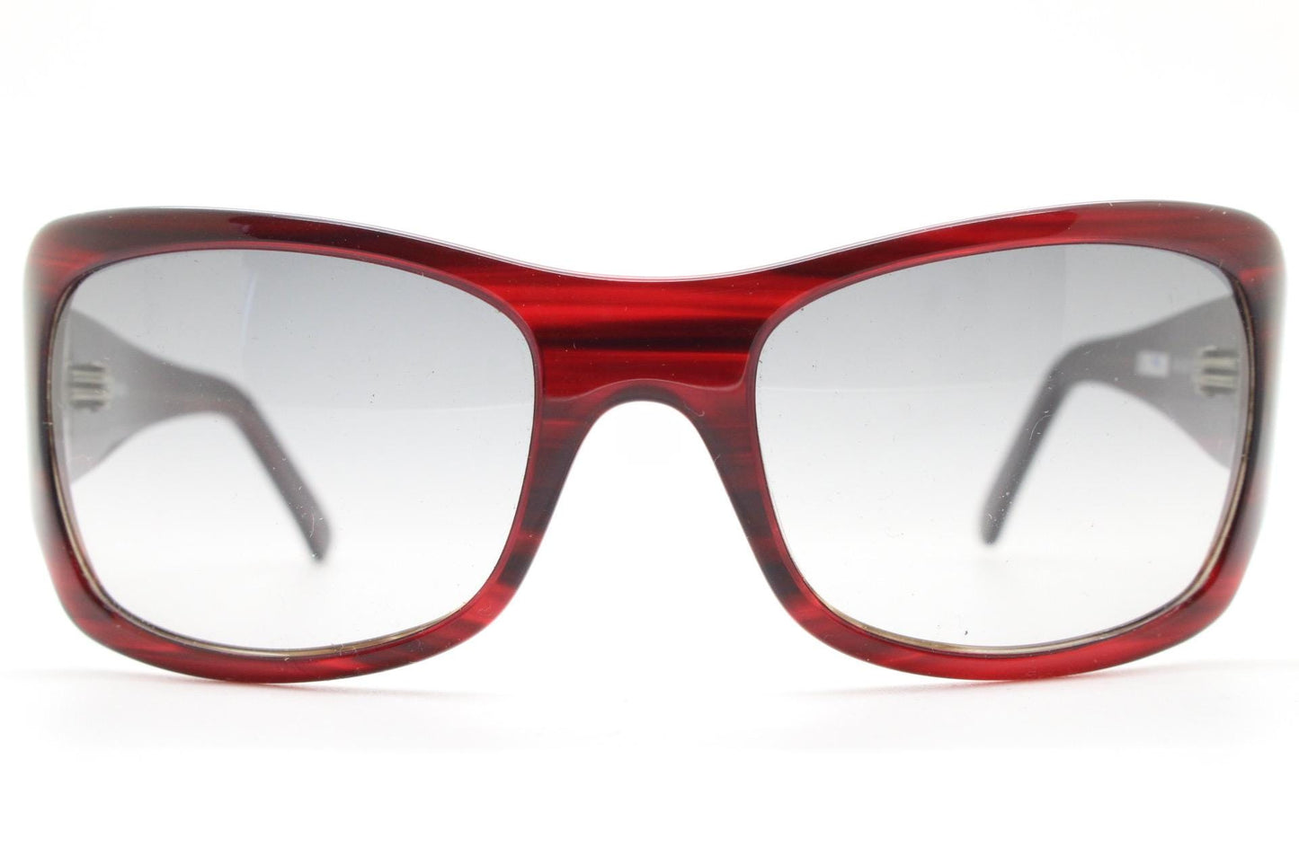 Y2k vintage wrap around large bug eye sunglasses. Curved red acetate shield frame with light tone lenses. 1960s bug eye design. 2000's NOS