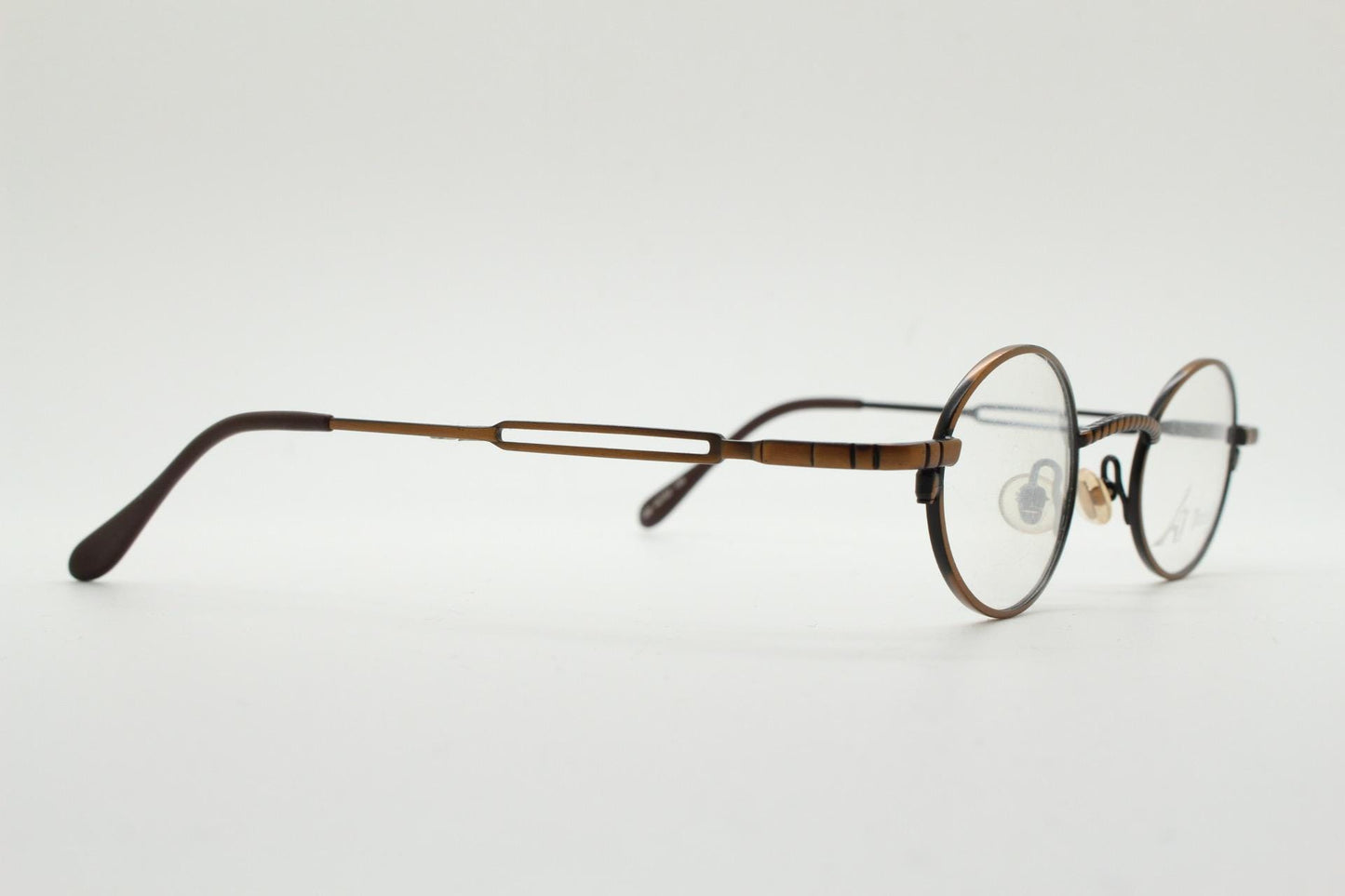 Paris Ma 90s vintage small oval eye glasses. Brushed bronze optical frames with charming arm details. Prescription. Steampunk spectacles NOS