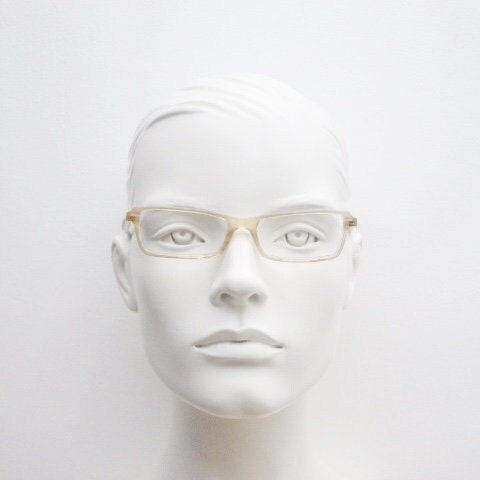 Alain Mikli rectangular eye glasses hand made in France. Low profile slim peach and blue transparent acetate optical frame. Prescription RX.