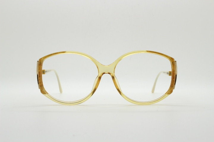 Christian Dior 70s vintage big round eye glasses made in Austria. Brown Optyl optical frames with distinctive logo. Prescription RX. NOS