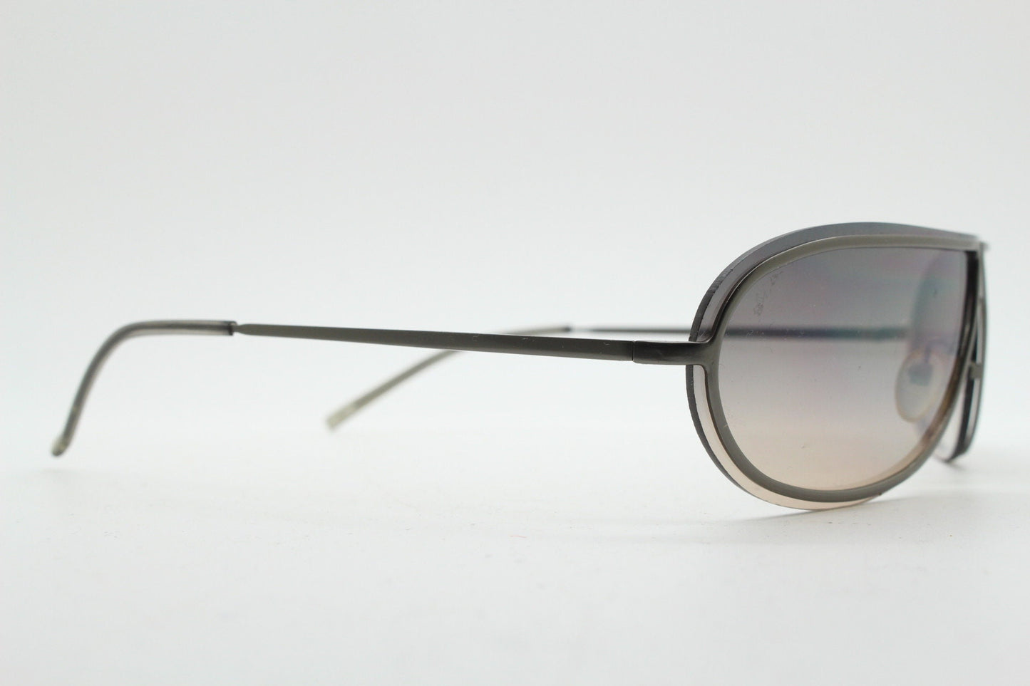 Y2K vintage visor aviator sunglasses. 2000's black low profile wraparound mono lens mini mask shield design with slim gunmetal arms. 00s NOS