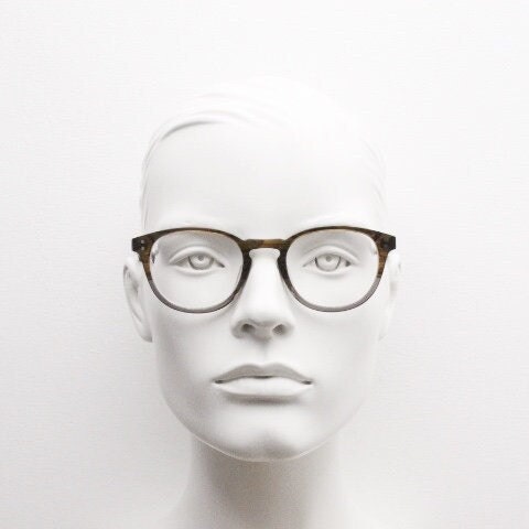 Land Rover vintage round 40s design eye glasses.Mottled brown and grey acetate optical frame with keyhole bridge. Prescription RX