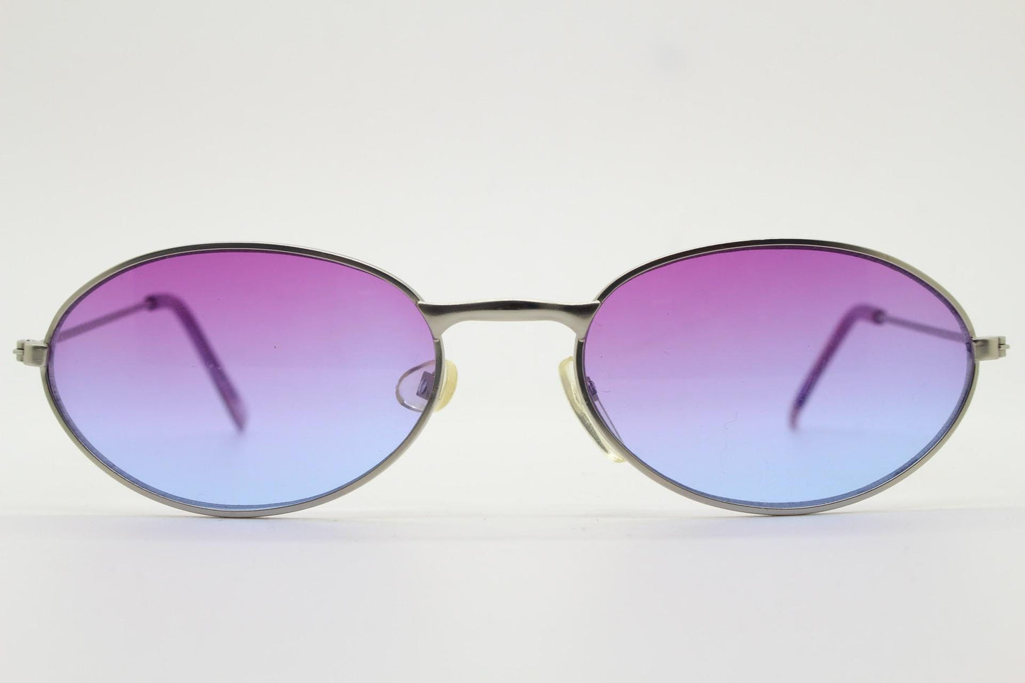 90s vintage small bug eye oval sunglasses. Silver satin frame with impressive pink to blue ombre graduating lenses. Y2K. 2000s. Unworn NOS