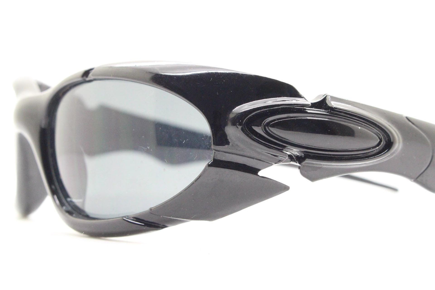 90s vintage sports shield sunglasses. All black gloss aerodynamic wraparound with many stylised features. 2000's. Hells angel uber fashion
