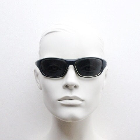 Y2K vintage sport shield sunglasses. All matt black wraparound aerodynamic visor with light green outline. 2000's. 90s. Unused NOS