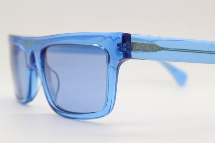 Kaleos rectangular flat top sunglasses. Bright sky blue acetate chunky frame with same colour lenses. BNWOT