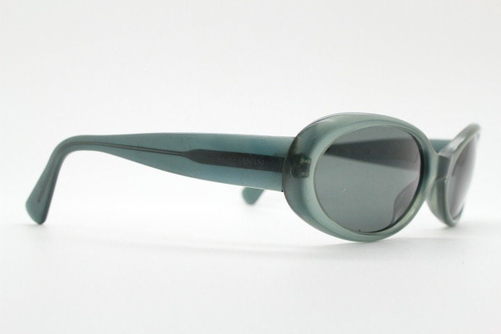 Giorgio Armani 90s vintage oval sunglasses made in Italy. Transparent grey\blue acetate frame with matching lenses. Small bug eye. Y2K