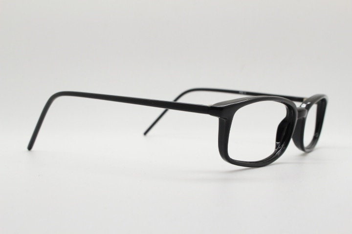 90s vintage modified wayfarer design eye glasses. Black low profile slim optical frames. Prescription eyeglasses. RX Spectacles. NOS