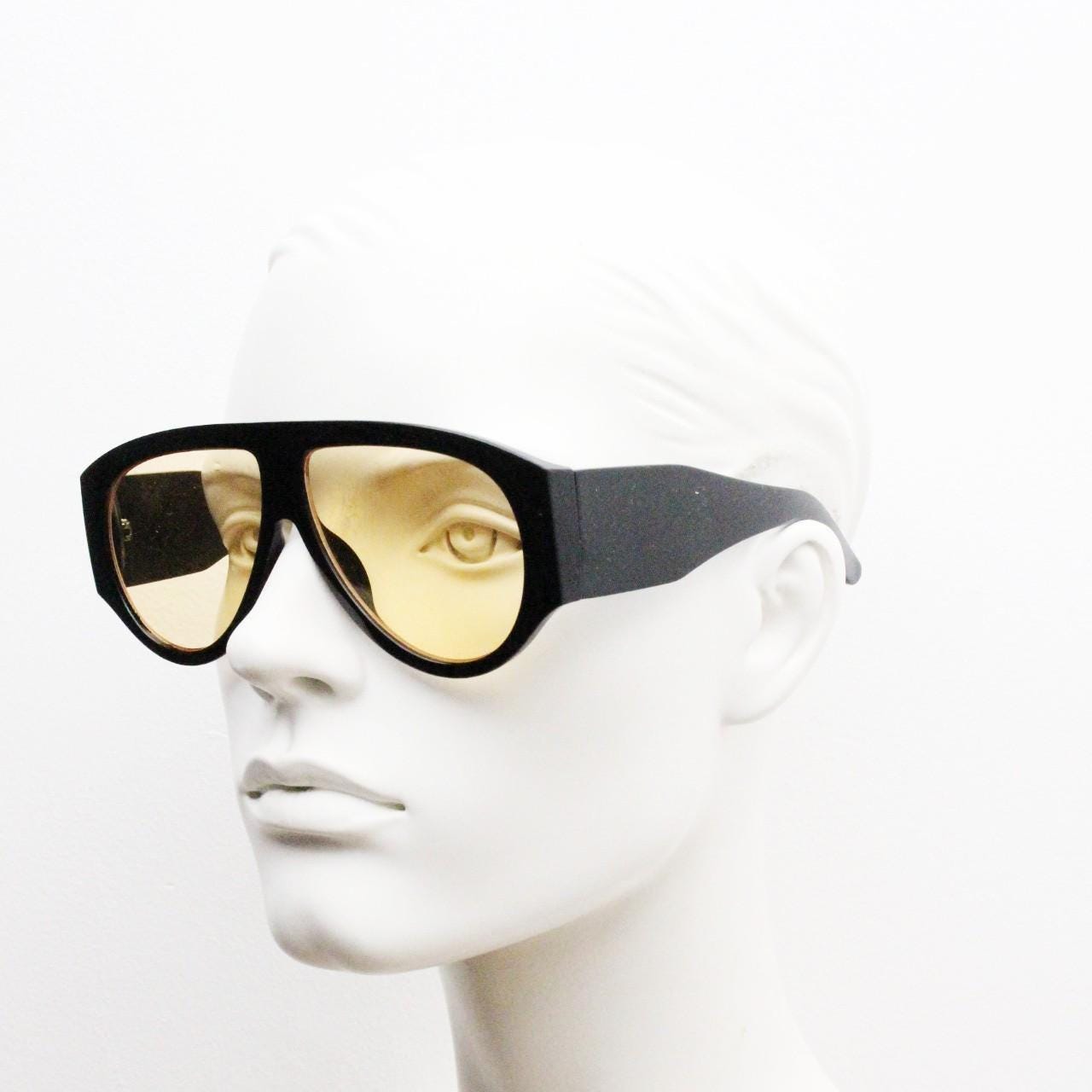 Vintage thick fat arm aviator sunglasses. Intense Black gloss frame with light tone brown lenses. Modified teardrop aviators. BNWT