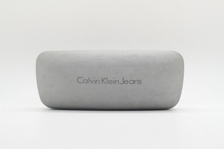 Calvin Klein rectangular eye glasses. Unisex transparent grey gloss acetate optical frames. Prescription eyeglasses. RX spectacles