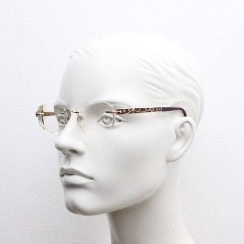 Silhouette rectangular frameless eye glasses made in Austria. Minimal optical frame with enamel and diamantes. Prescription RX. Rhinestone