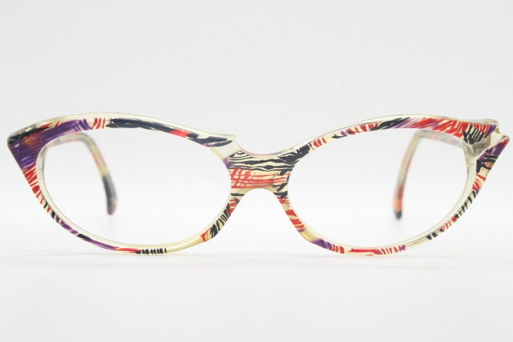 Alain Mikli Paris cat eye glasses made in France. Radical redefinition of the cateye optical frame. Womens prescription eyeglasses. RX