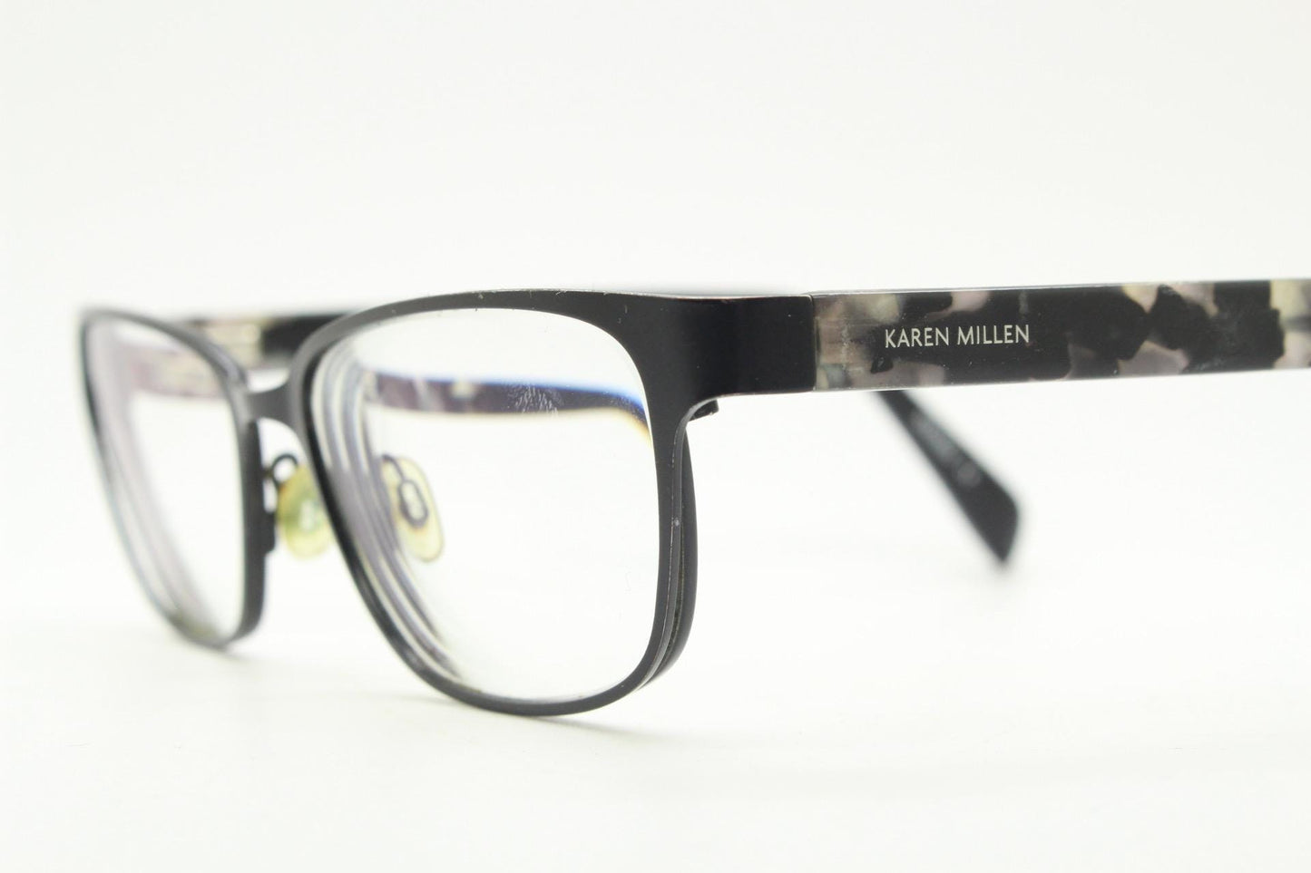 Karen Millen vintage rectangular cat eye glasses. Black satin finish metal front with grey marbled arms. Optical frames. Womens prescription