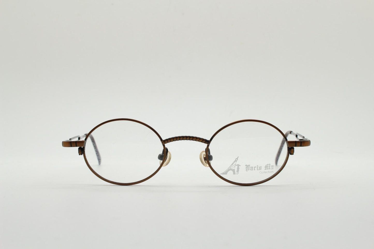 Paris Ma 90s vintage small oval eye glasses. Brushed bronze optical frames with charming arm details. Prescription. Steampunk spectacles NOS