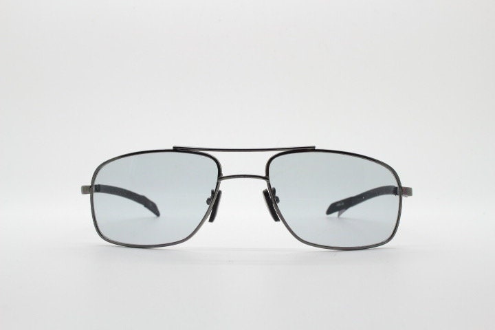 90s vintage modified rectangular aviator sunglasses. Gunmetal chrome frame aviators with light tone smoky grey lenses. Unused NOS