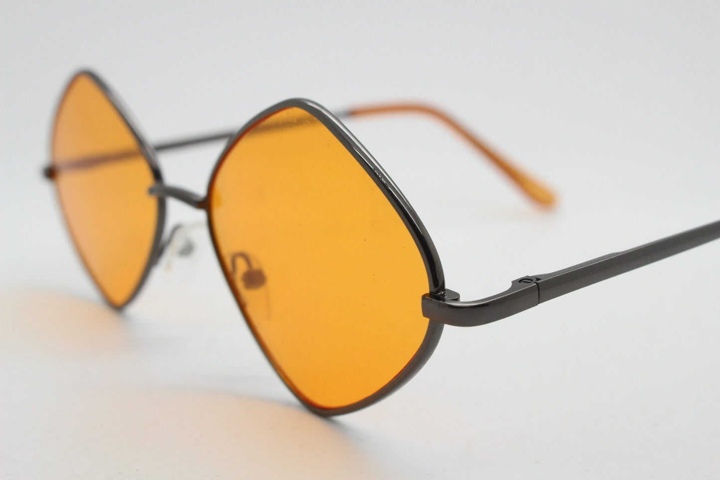 90s vintage diamond sunglasses. Minimal bronze brown psychedelic mod style frame with blazing orange lenses. Unused BNWT