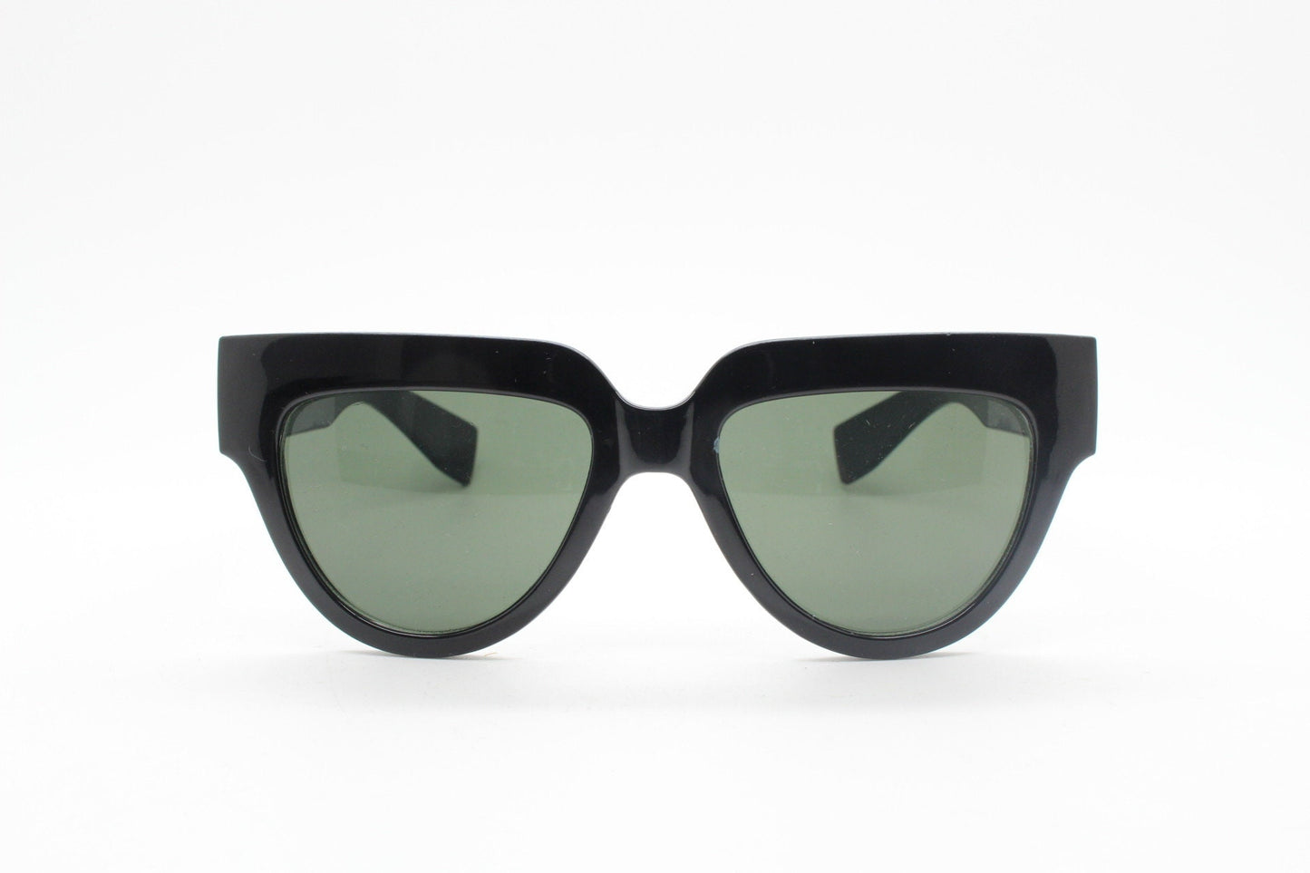 Vintage Y2K pointed cat eye sunglasses. Womens solid black 60s style flat brow cateye frame. Rockabilly. NOS catseye