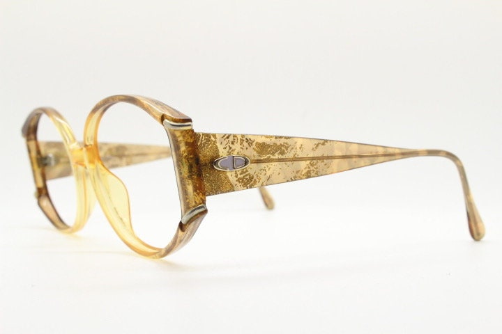 Christian Dior 70s vintage round eye glasses. Transparent honey colour optical frame with abstract gold sparkle patterns. Prescription RX