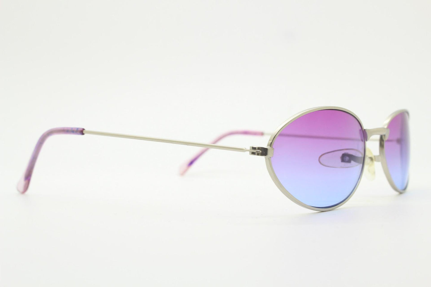 90s vintage small bug eye oval sunglasses. Silver satin frame with impressive pink to blue ombre graduating lenses. Y2K. 2000s. Unworn NOS