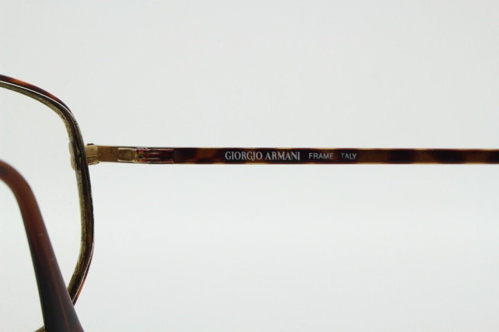 Giorgio Armani 90s vintage angular squared eye glasses made in Italy. Subtle metallic satin tiger print optical frames. Prescription RX