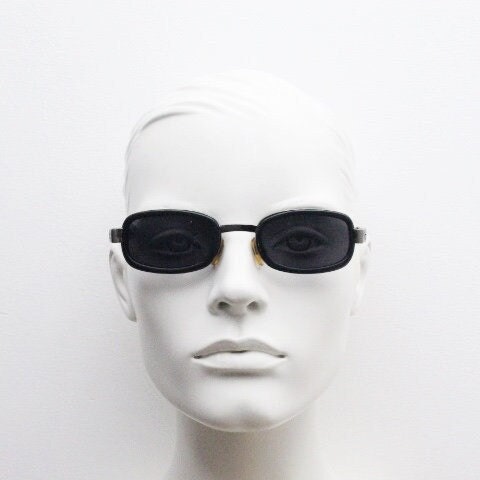 Byblos 90s vintage low profile rectangular sunglasses made in Italy. Gunmetal grey chrome frame with black insets and cut out arm logo's