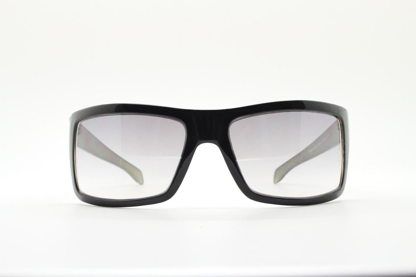 Y2k vintage wrap around large rectangular sunglasses. Curved black gloss frame with tasteful graduating lenses. 2000's NOS