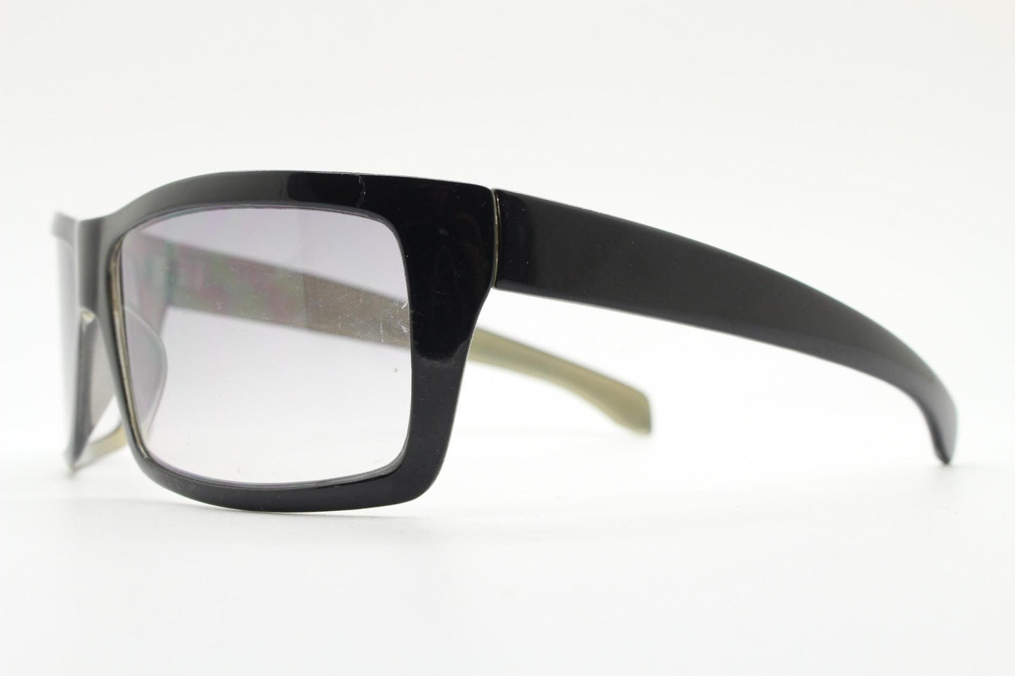 Y2k vintage wrap around large rectangular sunglasses. Curved black gloss frame with tasteful graduating lenses. 2000's NOS