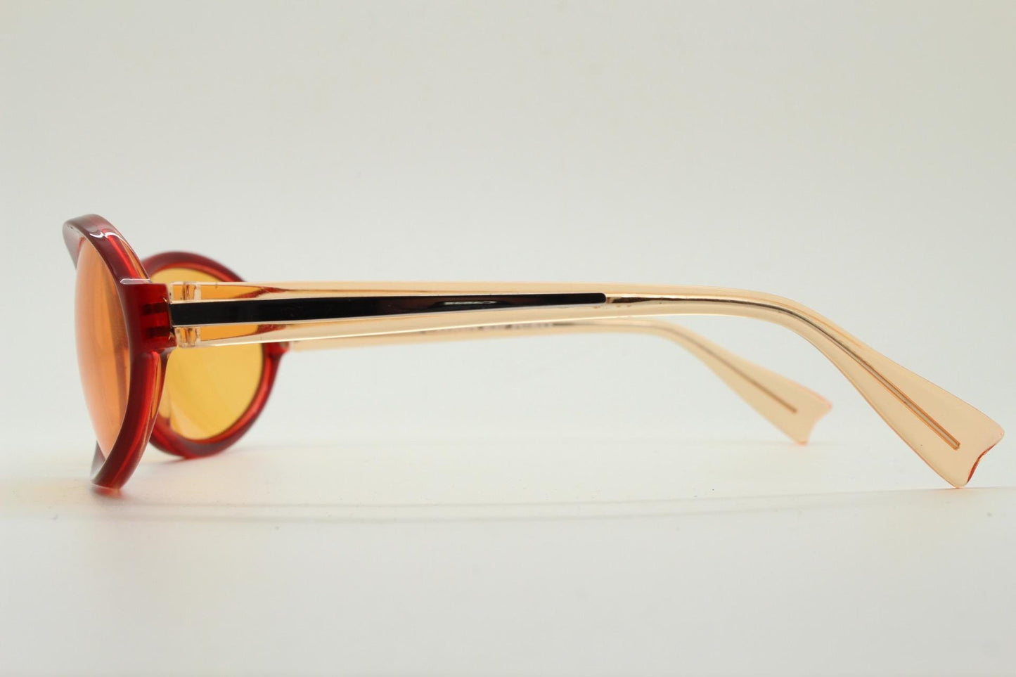 Alain Mikli Y2k vintage mini goggle sunglasses. Red transparent oval curved frame with blazing orange lenses. Definitive 2000s NOS