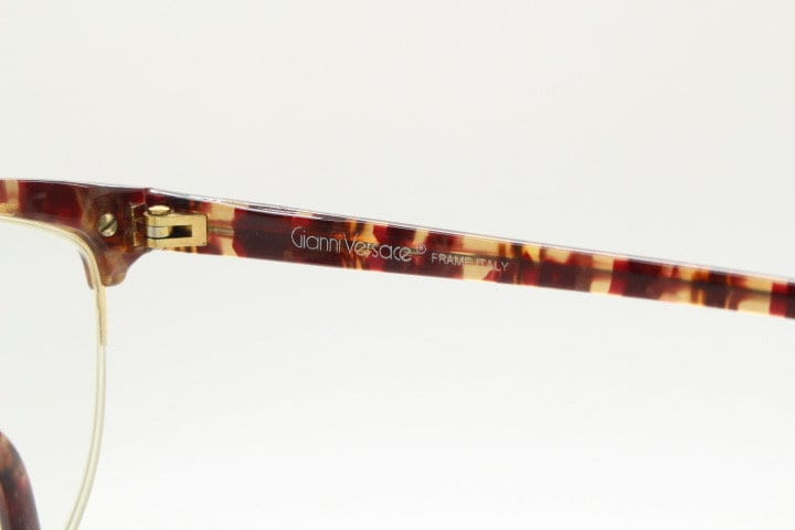 Versace 90s vintage brow line cat eye glasses made in Italy. Elegant tortoise acetate cateye optical half frames. Prescription RX eyeglasses