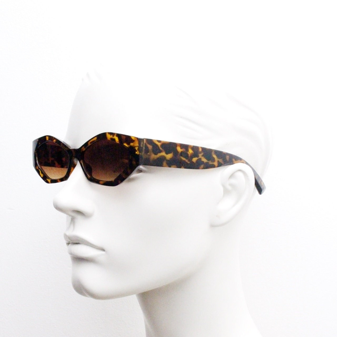 Vintage 90s low profile hexagon sunglasses. Honey tortoise sharp angled 6 sided frame with full height arms and amber lenses. Unused BNWT